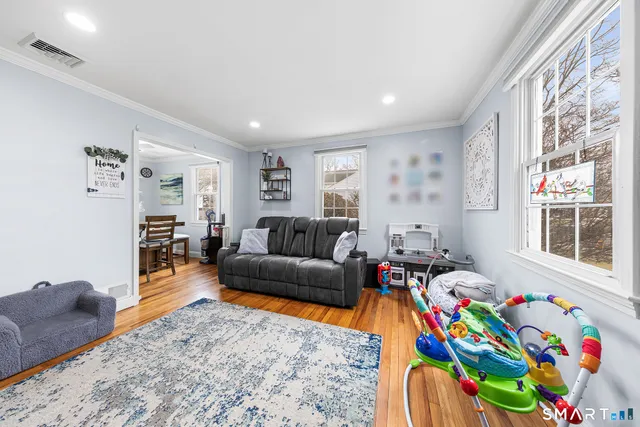 a living room with furniture and a couch