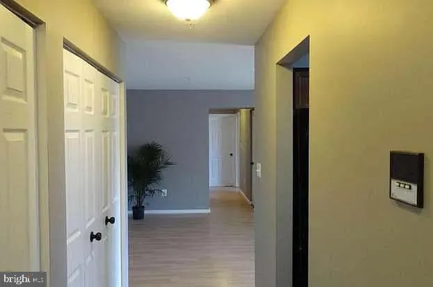 a view of a hallway with a small space