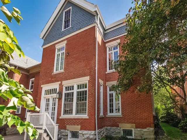 a front view of a multi story residential apartment building