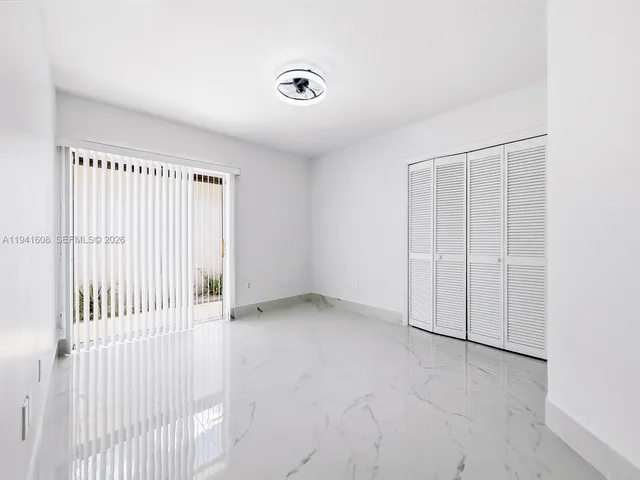 an empty room with windows