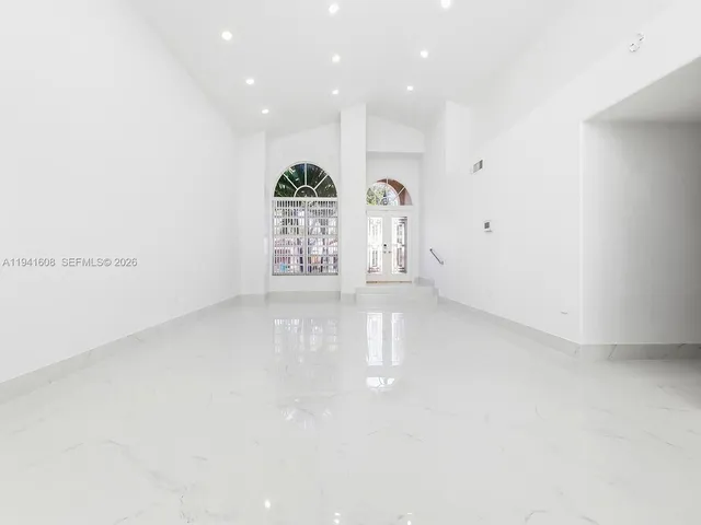 an empty room with windows