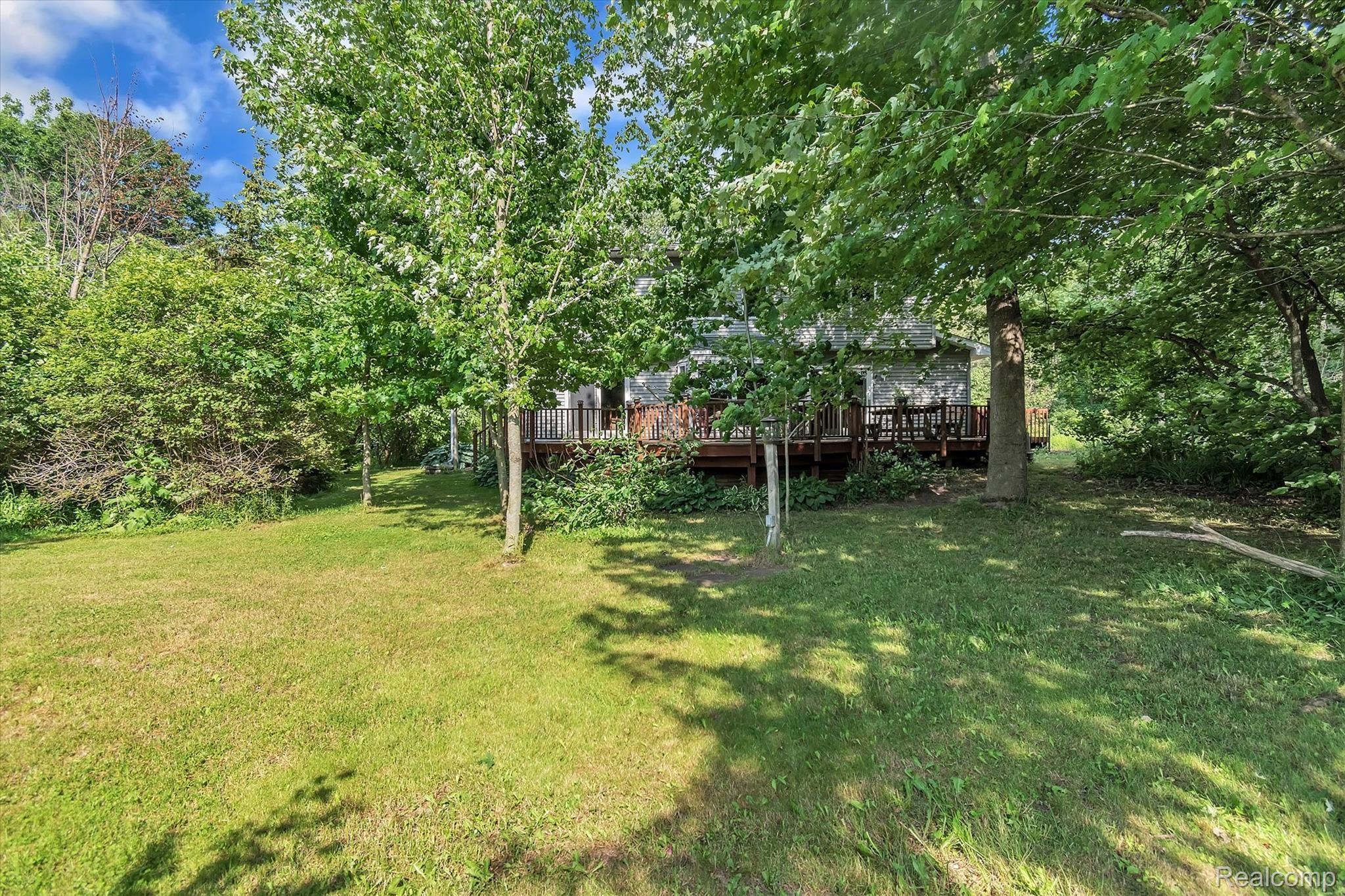 11174 Sharp Road Linden, MI 48451 - Photo 40 of 54 40 11174 Sharp - back yard to house.jpg