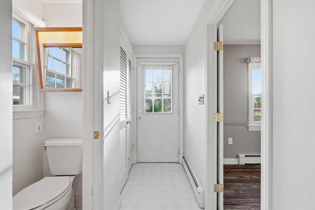 387 Massachusetts Avenue North Andover, MA 01845 - Photo 17 of 34 a bathroom with a toilet and a shower