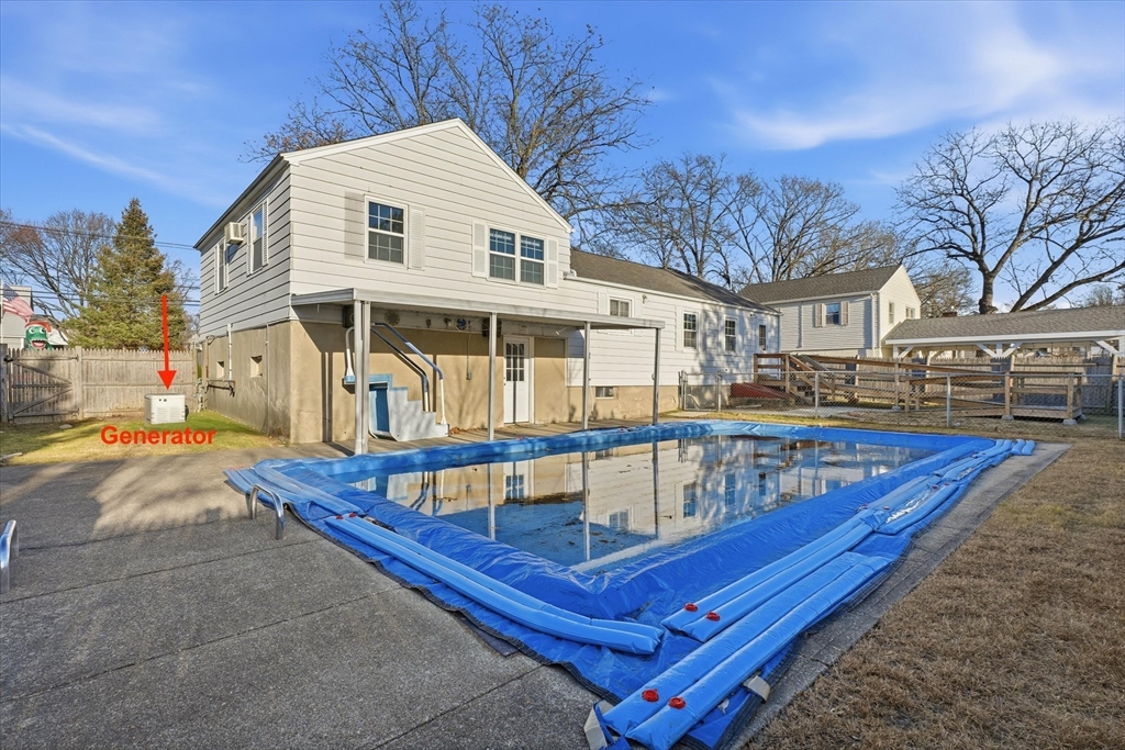 387 Massachusetts Avenue North Andover, MA 01845 - Photo 27 of 34 a view of a house with pool and a yard