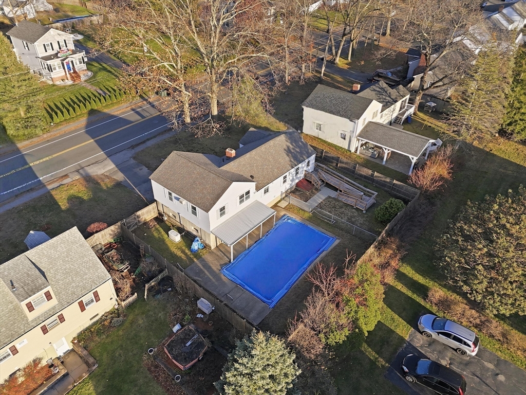 387 Massachusetts Avenue North Andover, MA 01845 - Photo 30 of 34 an aerial view of a house with a yard