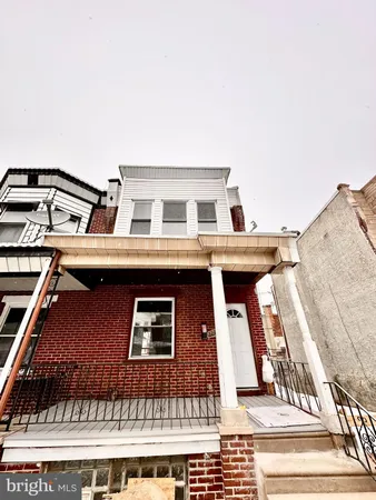 a front view of a house with a balcony