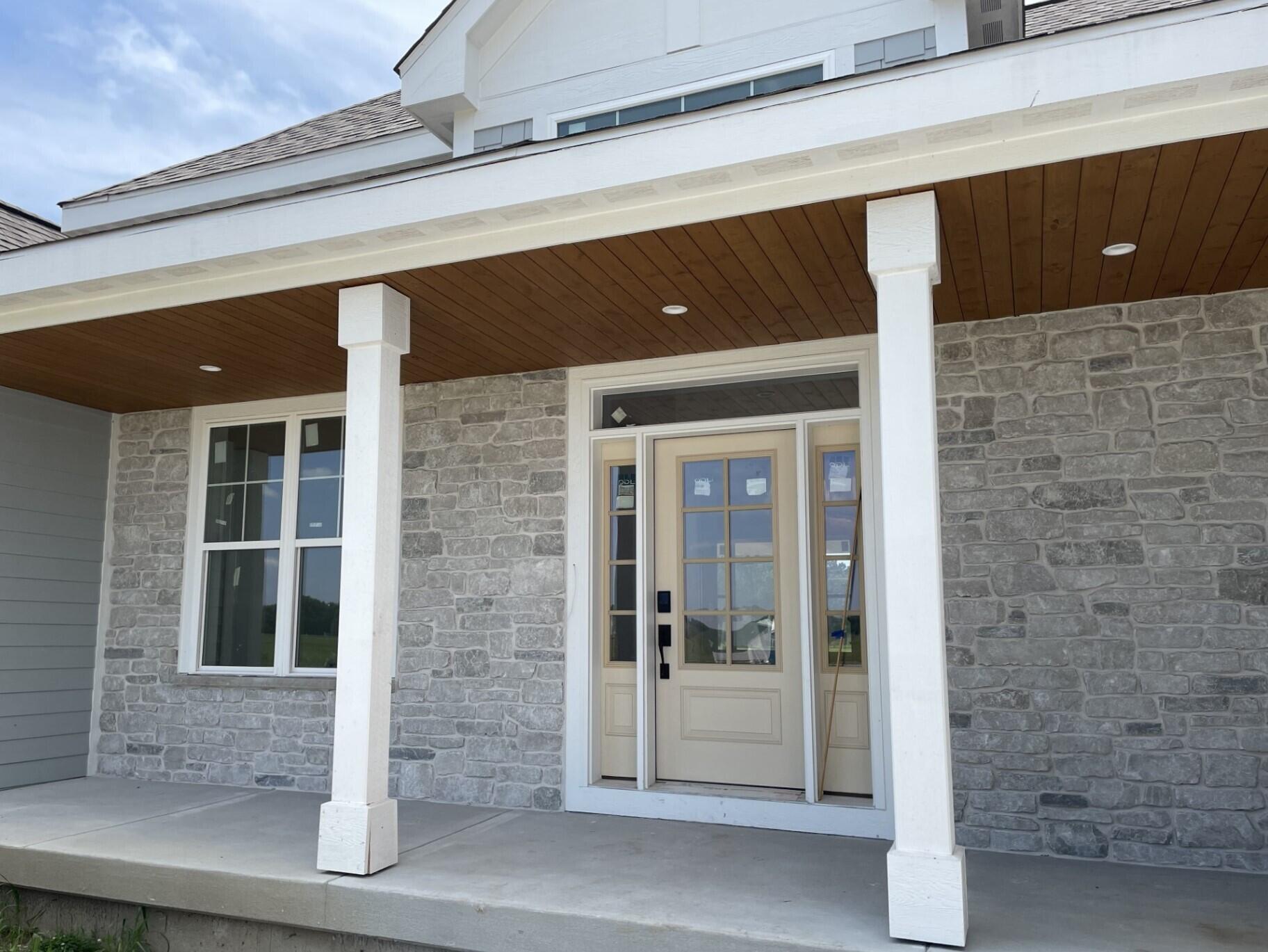 W358-n6309 W358-n6309 Ennis Road Oconomowoc, WI 53066 - Photo 2 of 47 Spacious Front Porch