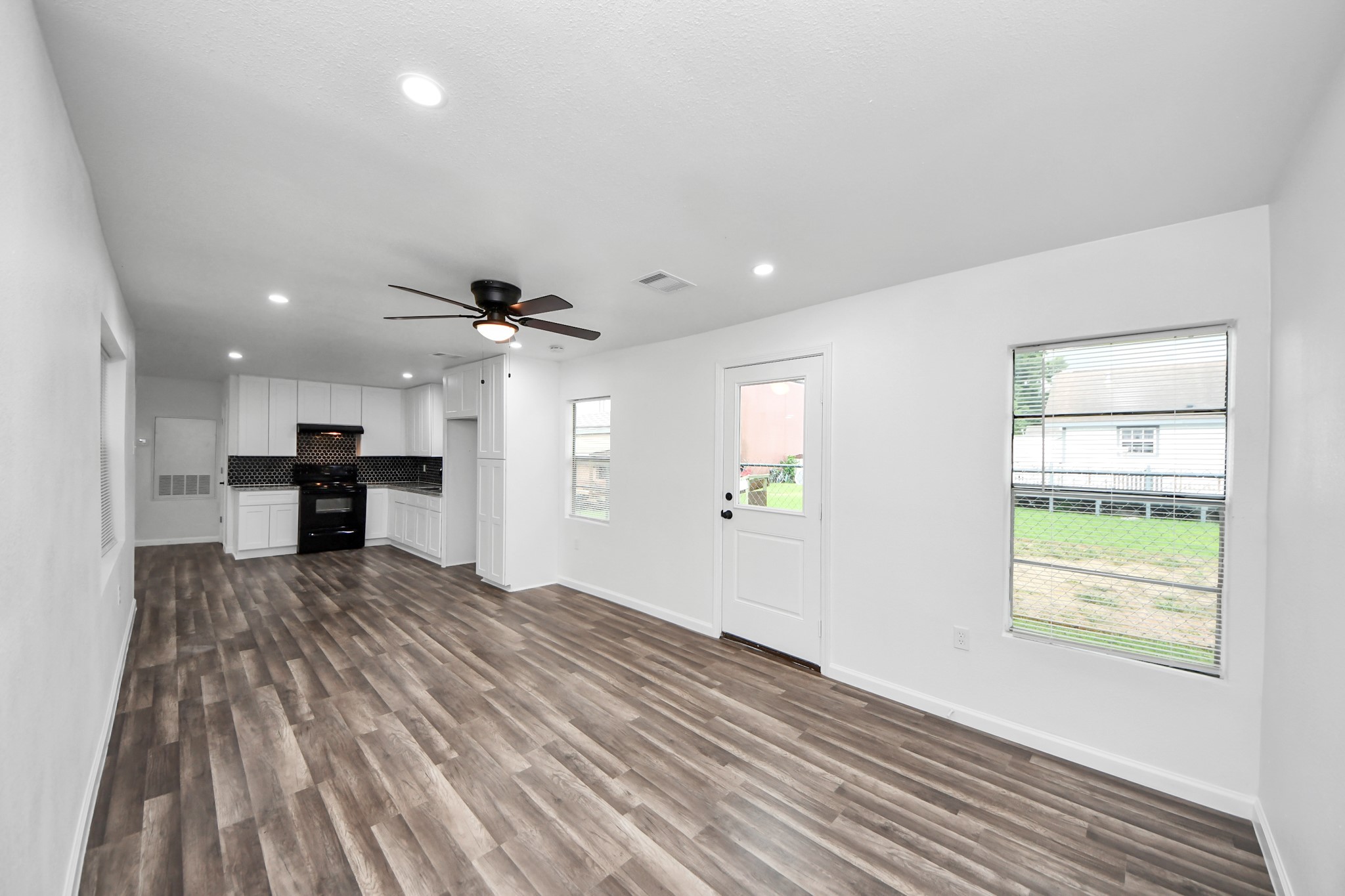 207 East Defee Avenue Baytown, TX 77520 - Photo 16 of 36 a view of kitchen with sink and window