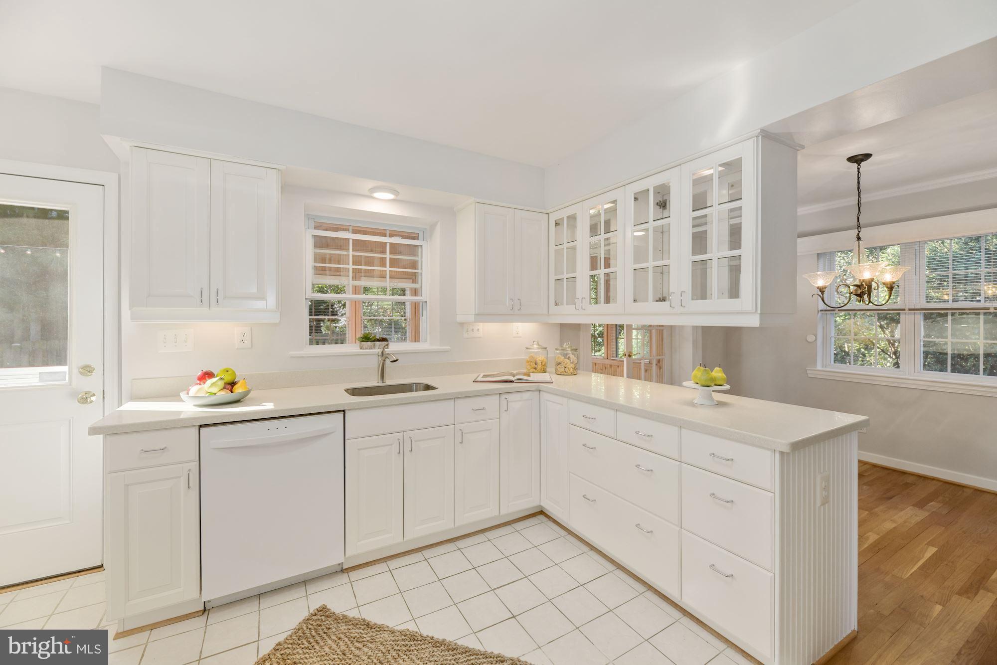 12 West Braddock Road Alexandria, VA 22301 - Photo 14 of 35 Kitchen has a pass thru window to sunroom