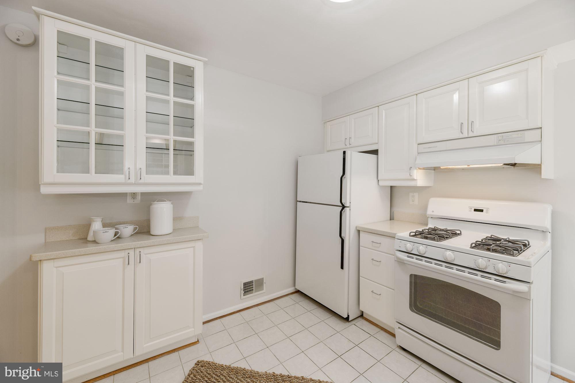 12 West Braddock Road Alexandria, VA 22301 - Photo 15 of 35 Glass front cabinets and ceramic tile floor