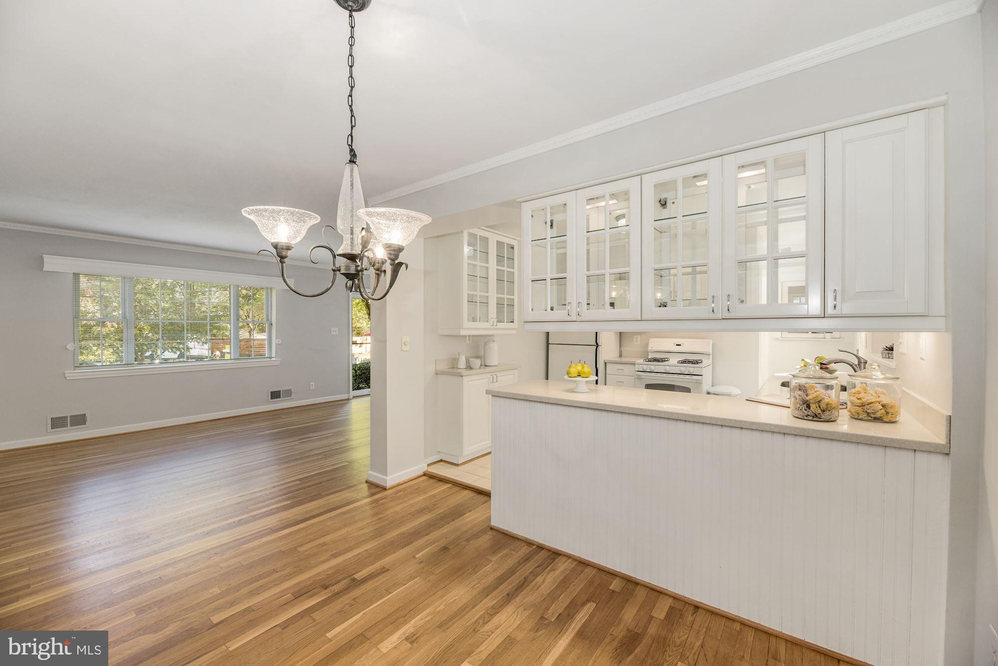 12 West Braddock Road Alexandria, VA 22301 - Photo 17 of 35 Dining room has open counter space from kitchen
