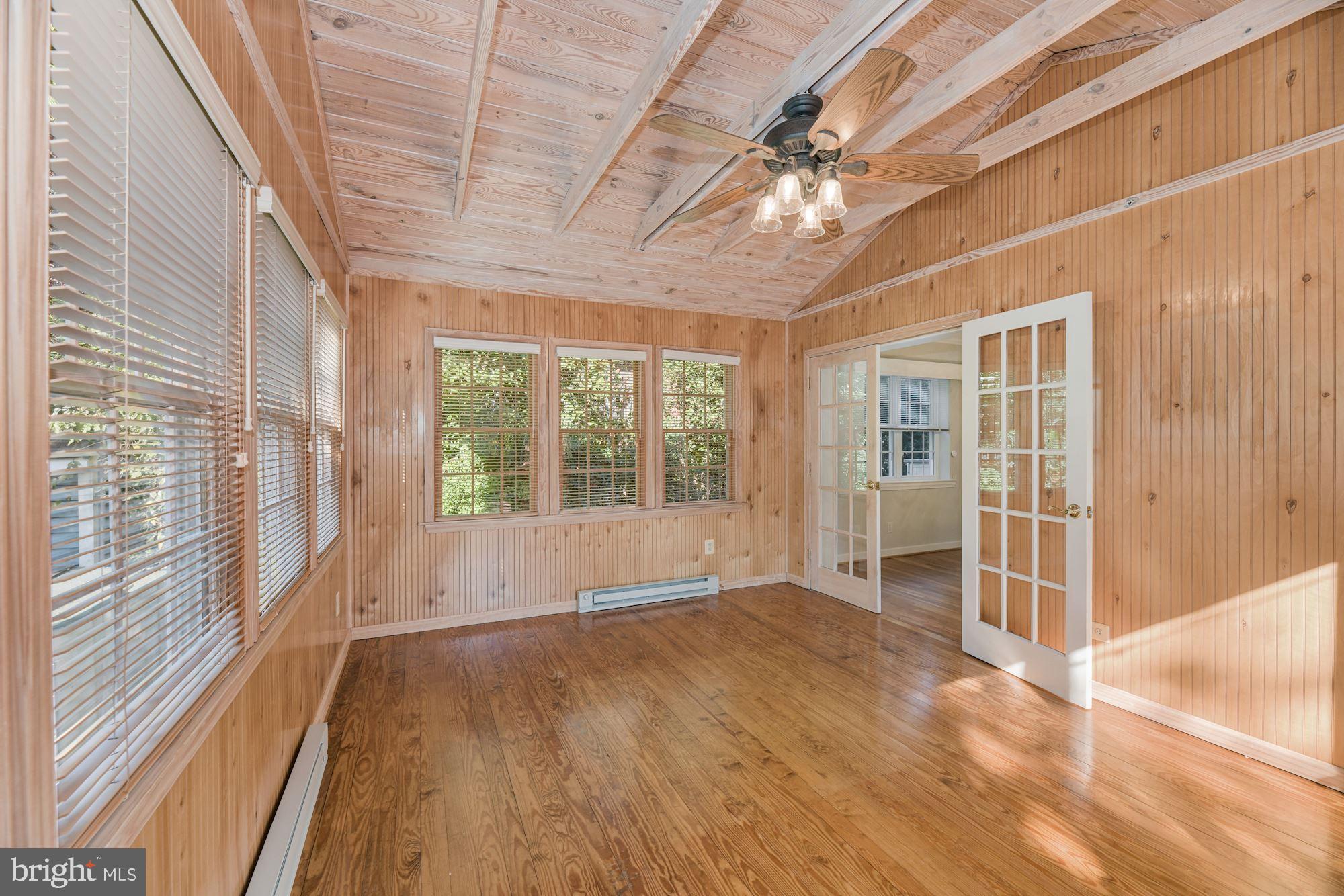 12 West Braddock Road Alexandria, VA 22301 - Photo 19 of 35 French doors from DR to sunroom w walls of windows