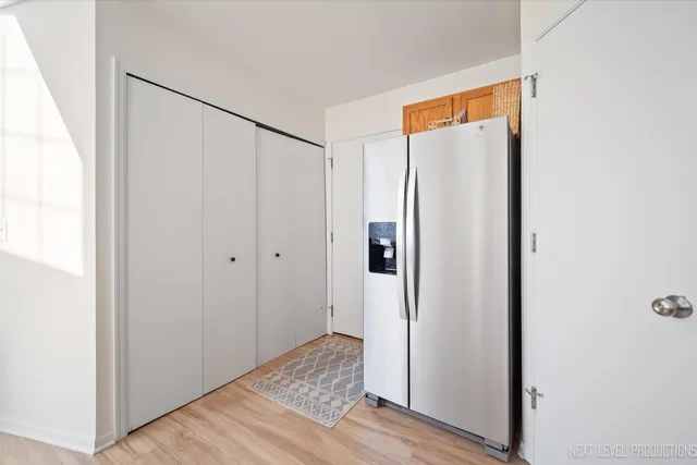a kitchen that has a sink and a stove in it
