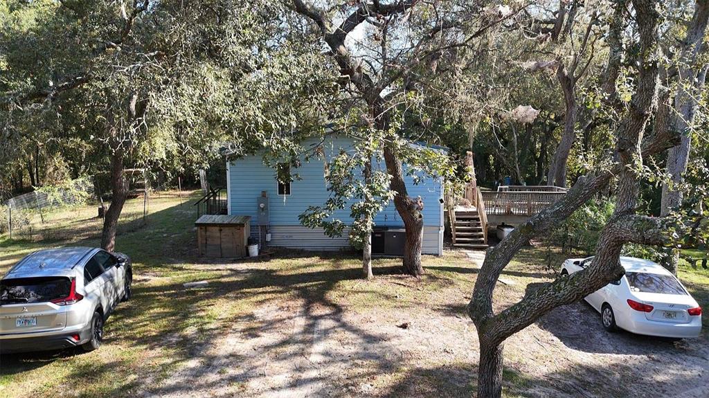 8735 Cr 631a Bushnell Bushnell, FL 33513 - Photo 11 of 17 a view of a house with a yard