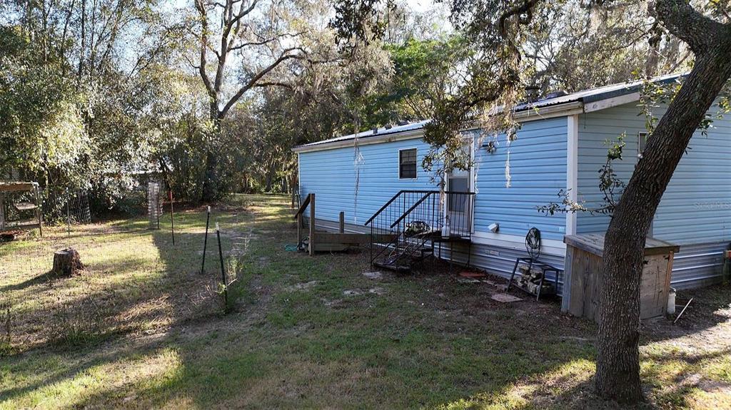8735 Cr 631a Bushnell Bushnell, FL 33513 - Photo 12 of 17 a view of a house with backyard