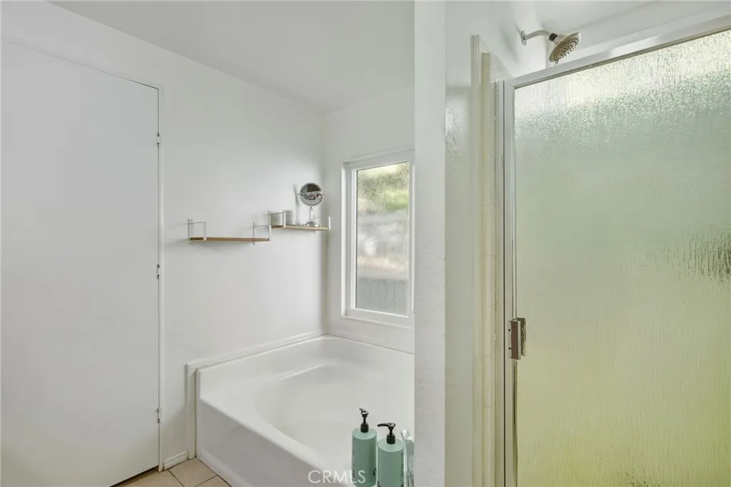 1051 Site, Unit 236 Brea, CA 92821 - Photo 12 of 19 a bathroom with a bathtub