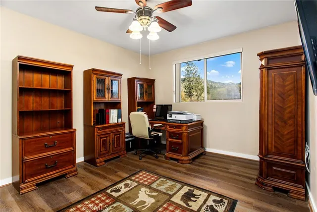 a view of a fountain in the backyard of a house