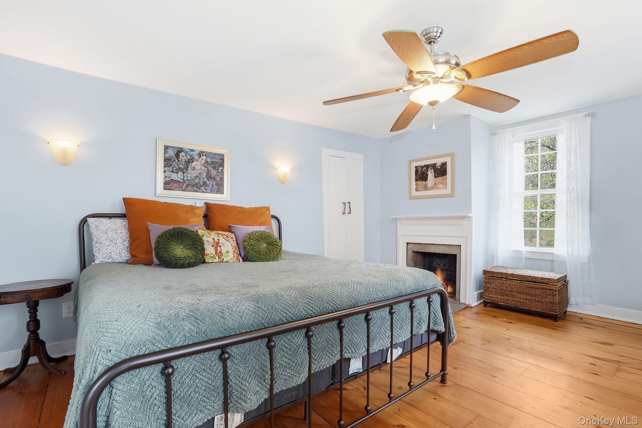 1141 Beekman Road Hopewell Junction, NY 12533 - Photo 21 of 36 a bedroom with furniture and a fireplace