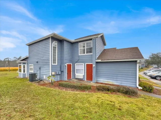 a house view with a backyard space