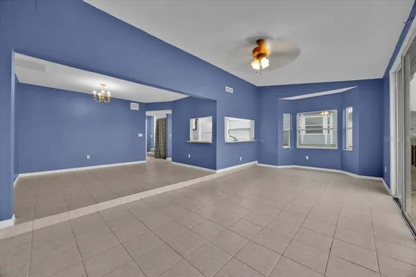 a view of an empty room and window