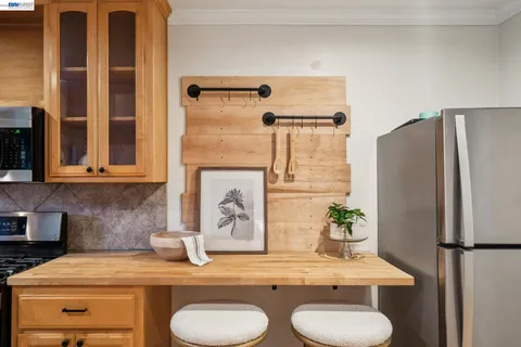 a kitchen with a stove and a microwave
