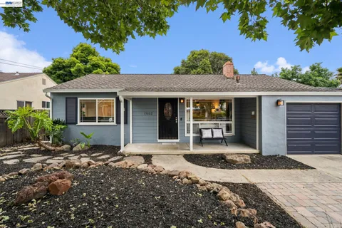 a front view of a house with a porch