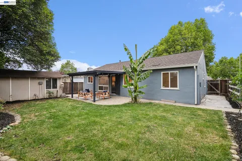 a front view of a house with patio