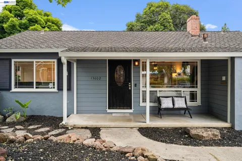 a front view of a house with a porch