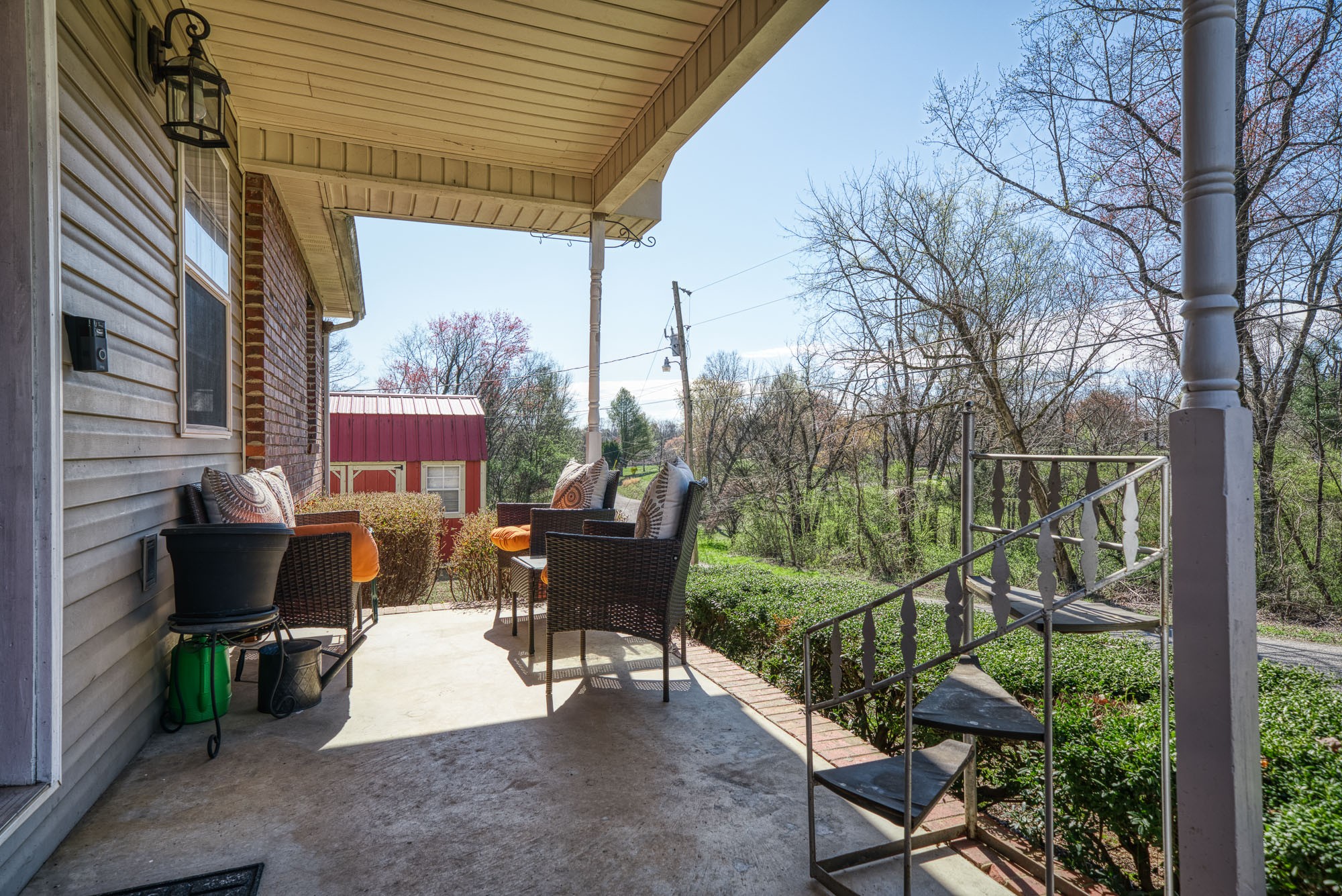 162 Adams Street Spring City, TN 37381 - Photo 11 of 35 a view of a sitting area with furniture and a yard