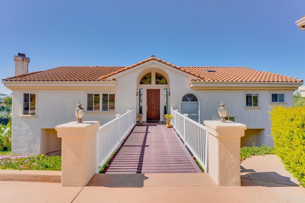 a front view of a house with a porch