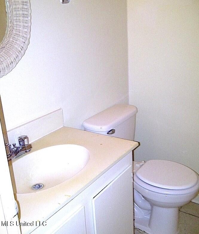 836 Riverview Drive, Unit 7 Jackson, MS 39202 - Photo 10 of 12 Bathroom with vanity toilet