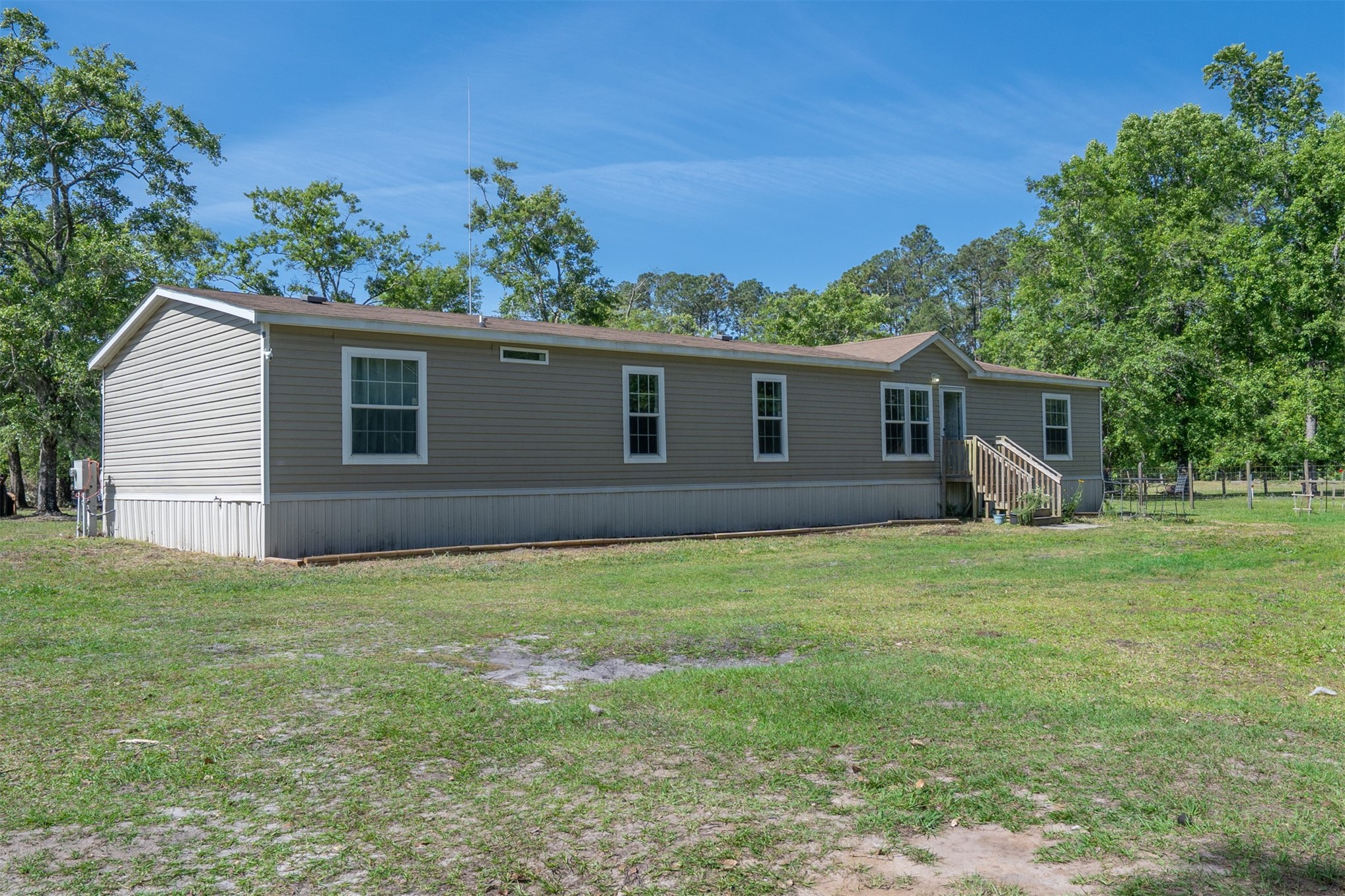 76220 Dove Road Yulee, FL 32097 - Photo 13 of 48 a house view with a garden space