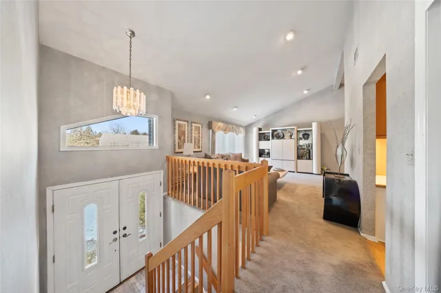 a view of front door with furniture