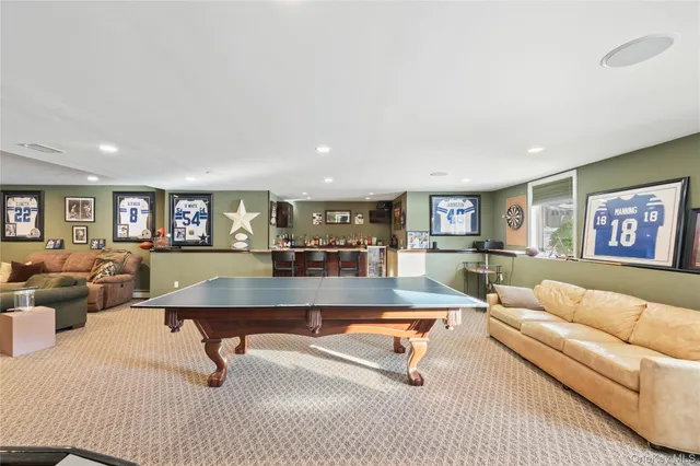 a living room with furniture and a table