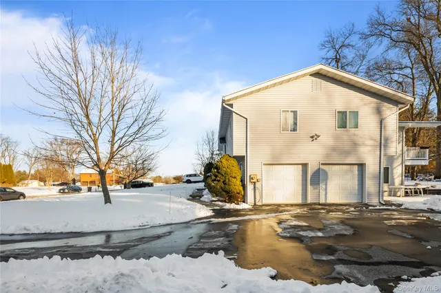 a view of a house with snow