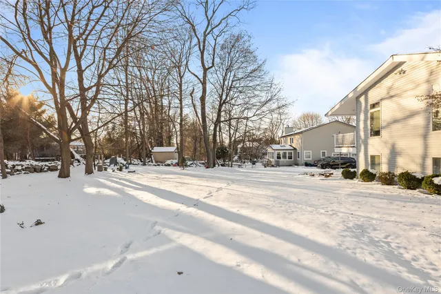 a view of road with a house