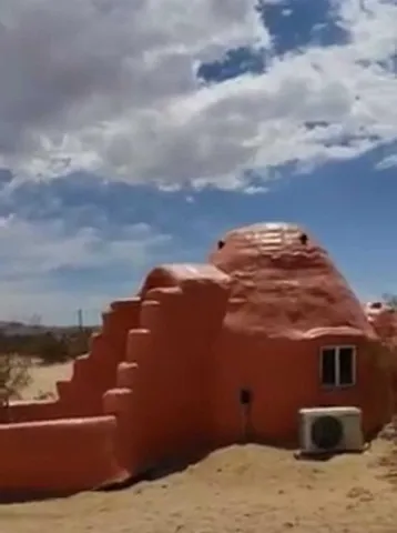 a kitchen with a dining table and chairs