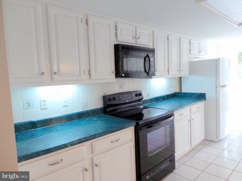 738 Bellefield Road, Unit 99 Dowell, MD 20629 - Photo 7 of 30 Plenty of Cabinets and Counter space