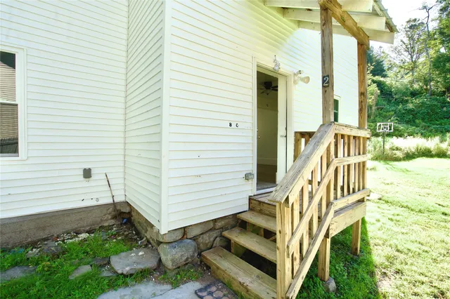 a view of a back yard of the house