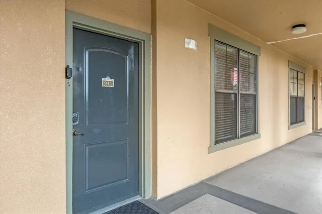 a kitchen with stainless steel appliances a refrigerator and a cabinets