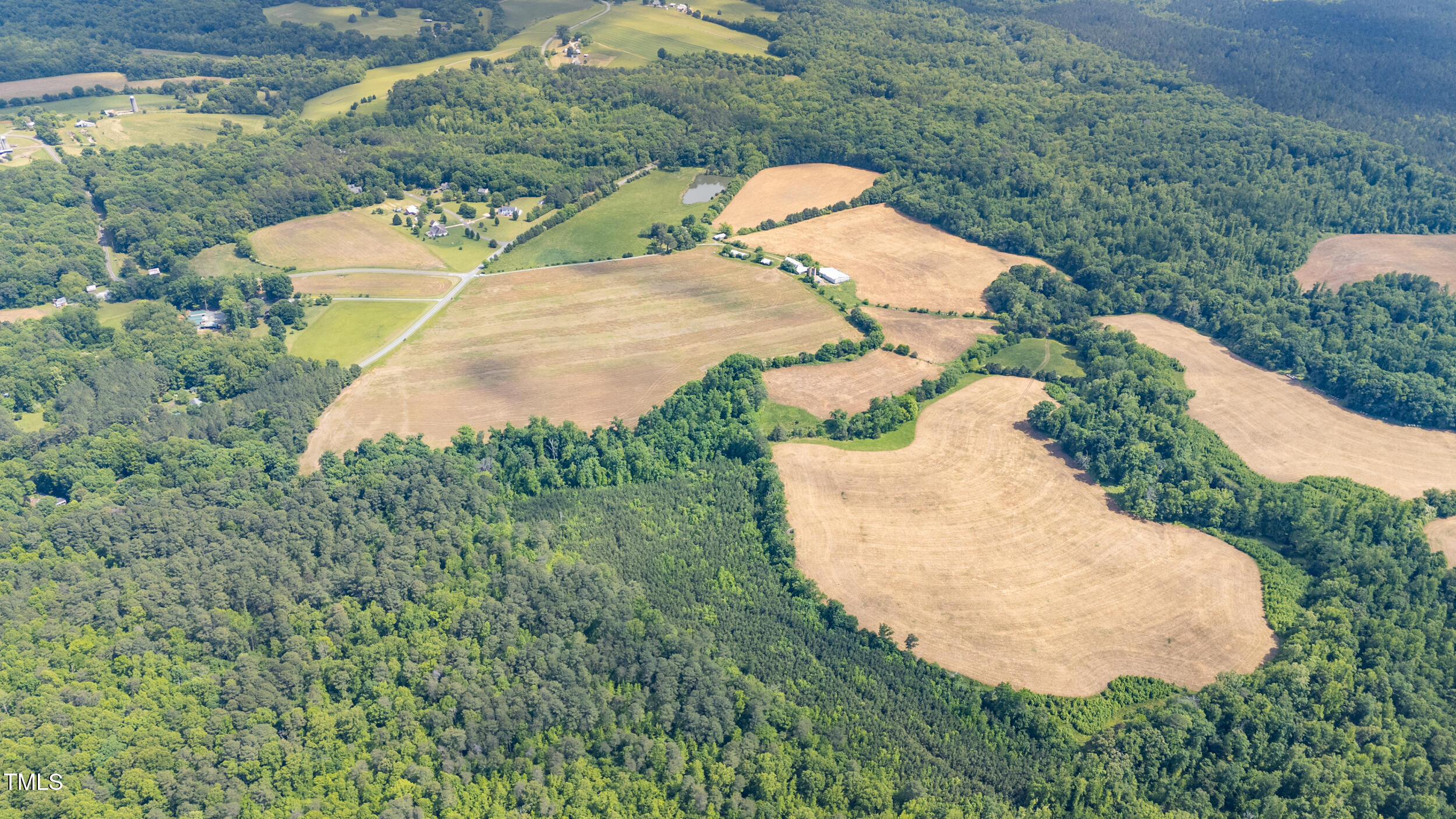 7941 Morrow Mill Road Graham, NC 27253 - Photo 15 of 17 an aerial view of a house with yard and outdoor seating