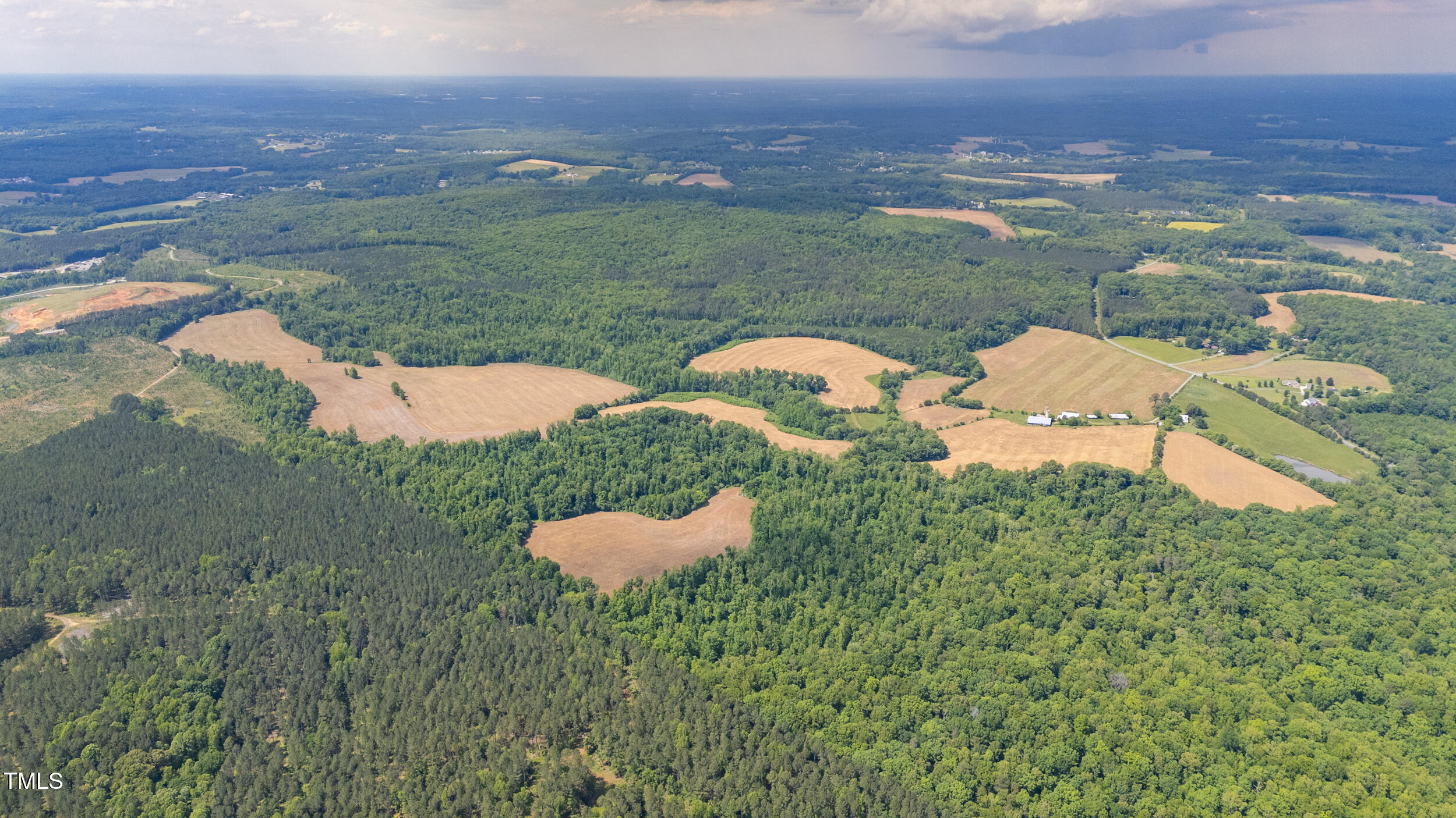 7941 Morrow Mill Road Graham, NC 27253 - Photo 6 of 17 a view of a lake with a yard