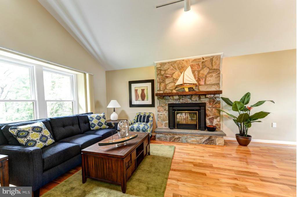 23 Tower Point Road Chesapeake City, MD 21915 - Photo 4 of 30 Living Room with wood burning fireplace