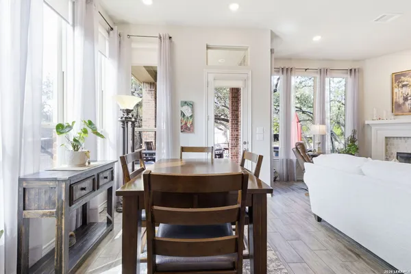 a view of a living room and dining room