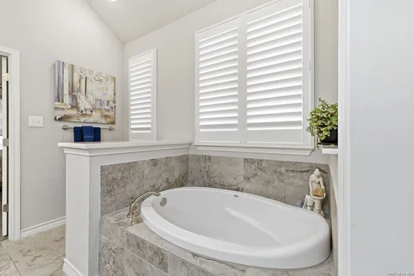 a bathroom with a sink and a bathtub
