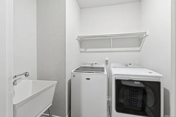 a utility room with a washer and dryer