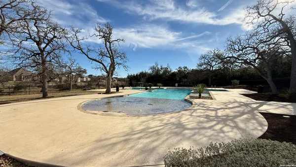 a view of outdoor space with swimming pool