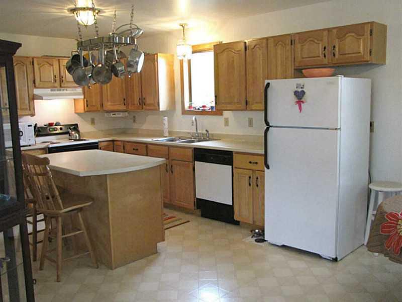 24 Field Road Sidney, ME 04330 - Photo 18 of 30 Kitchen. Custom cabinets & island.