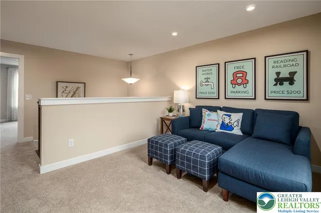 a living room with furniture and a couch