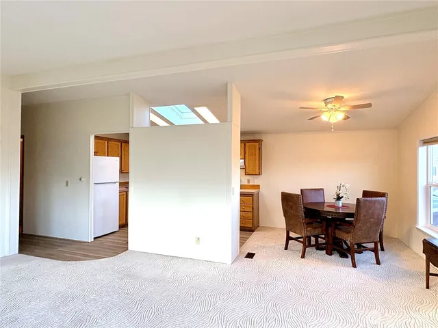 a bedroom with a bed and a desk